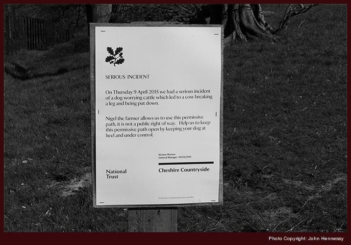 Cow worrying sign, Hare Hill, Prestbury, Cheshire, England