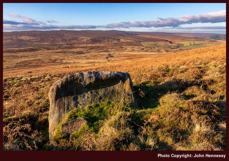 Boundary Stone and Derwent Moors as seen near Stanage End, Hollow Meadows, Derbyshire, England